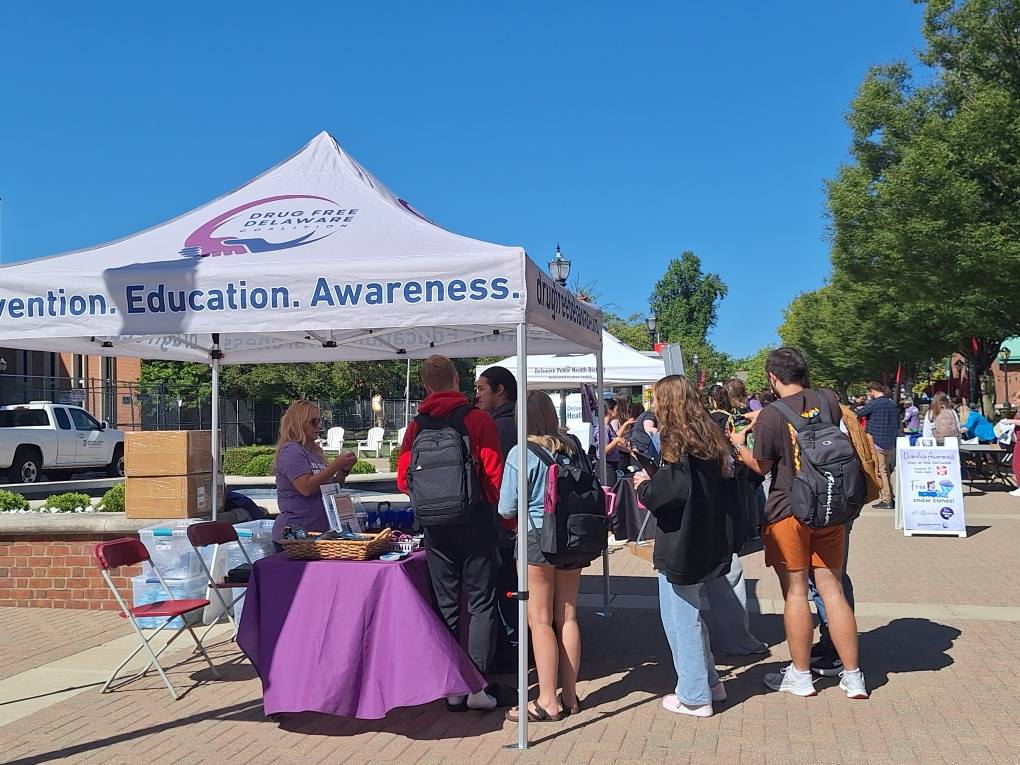 Drug Free Delaware outreach booth engaging students at Ohio Wesleyan University.