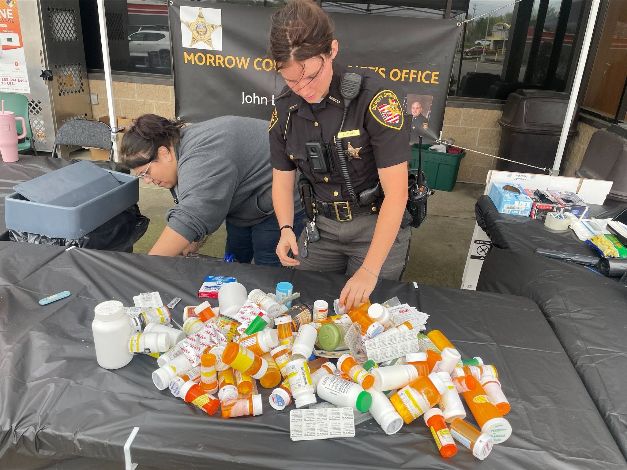 Morrow County Sheriff's Office staff sorting medications during a take-back event.